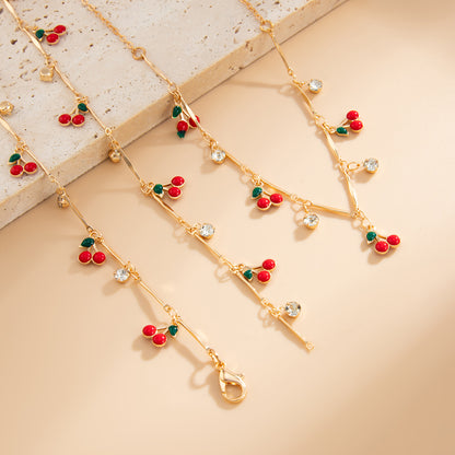 Red Enamel and Cubic Zirconia Goldtone Cherry Station Y-Necklace Set, gold pendant necklace for women, detail close-up