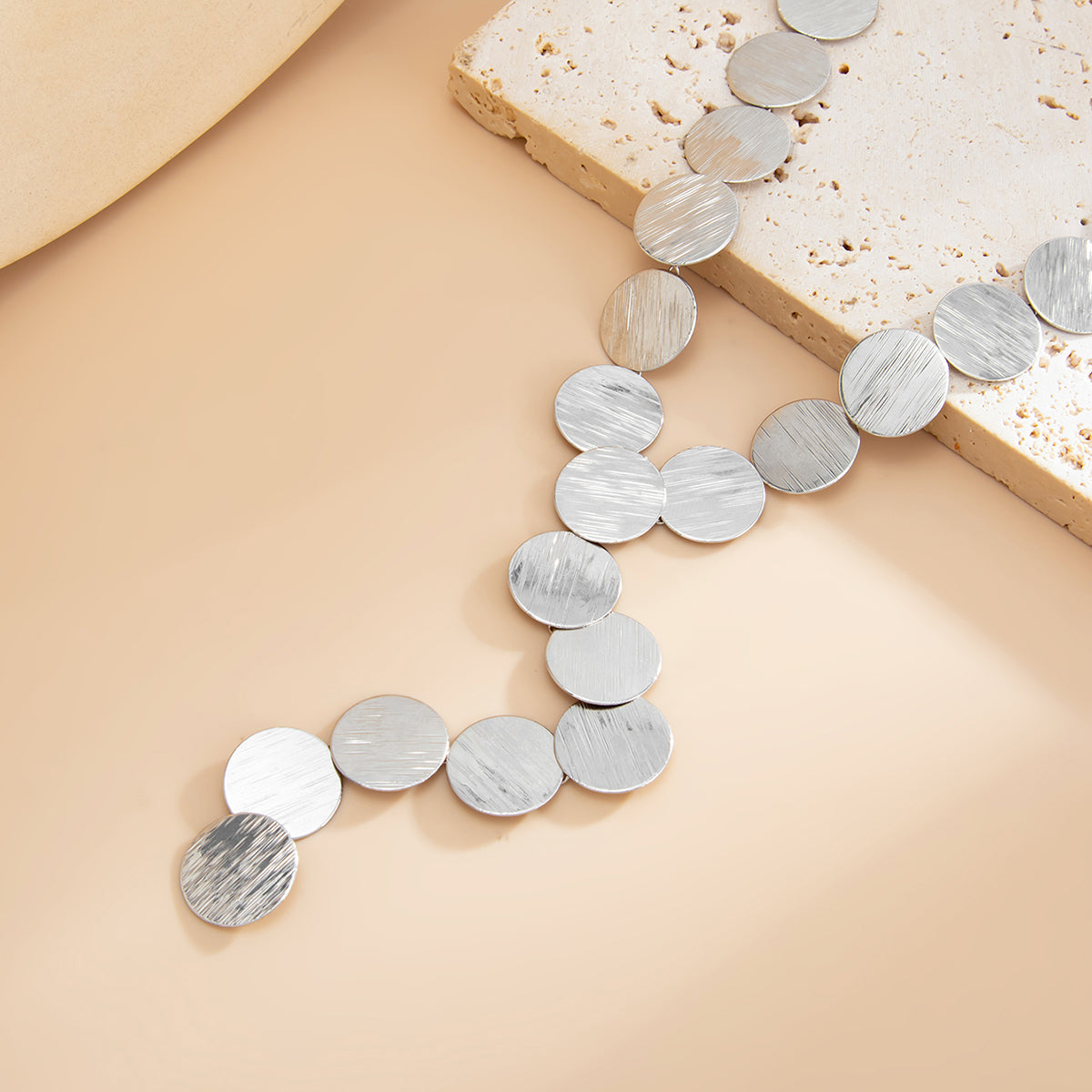Silvertone Disc Statement Y-Necklace, dainty minimalist design, detail close-up
