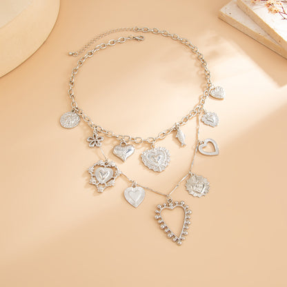 Silvertone Heart Flower Fish Statement Necklace, dainty minimalist design, side view