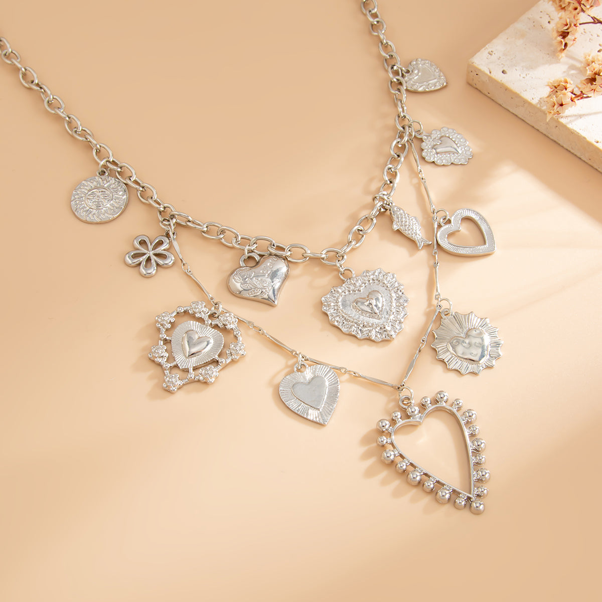 Silvertone Heart Flower Fish Statement Necklace, dainty minimalist design, detail close-up
