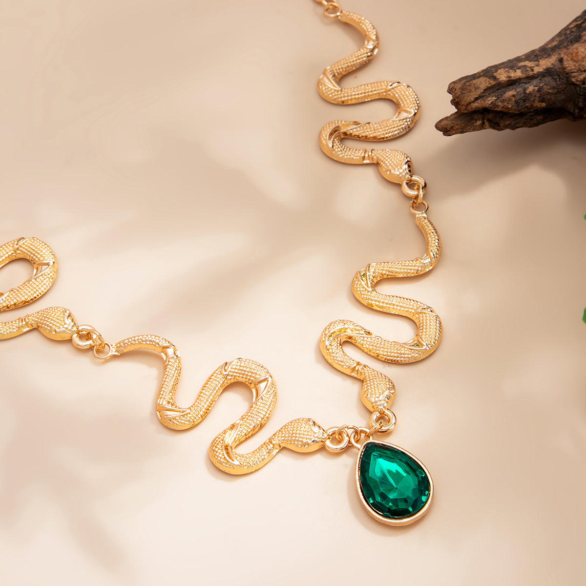Crystal and Goldtone Textured Snake Drop Choker, vintage-inspired design, detail close-up