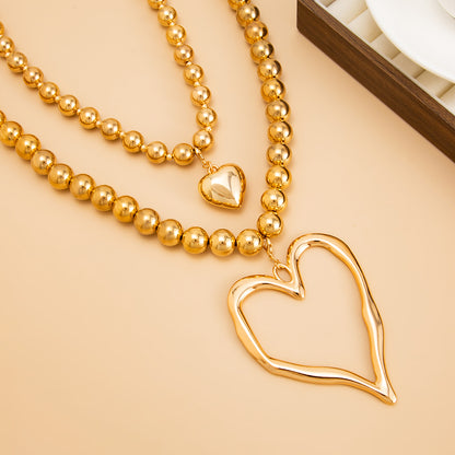 Goldtone Beads Chain Heart Pendant Statement Necklace Set, gold pendant necklace for women, everyday style, detail close-up