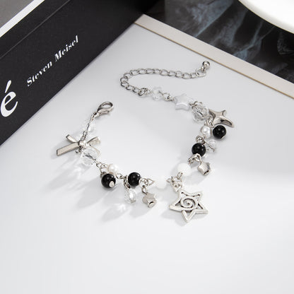 Black Resin and Acrylic Pearl Silvertone Star Bow Charm Bracelet, silver bracelet for women, everyday style, detail close-up