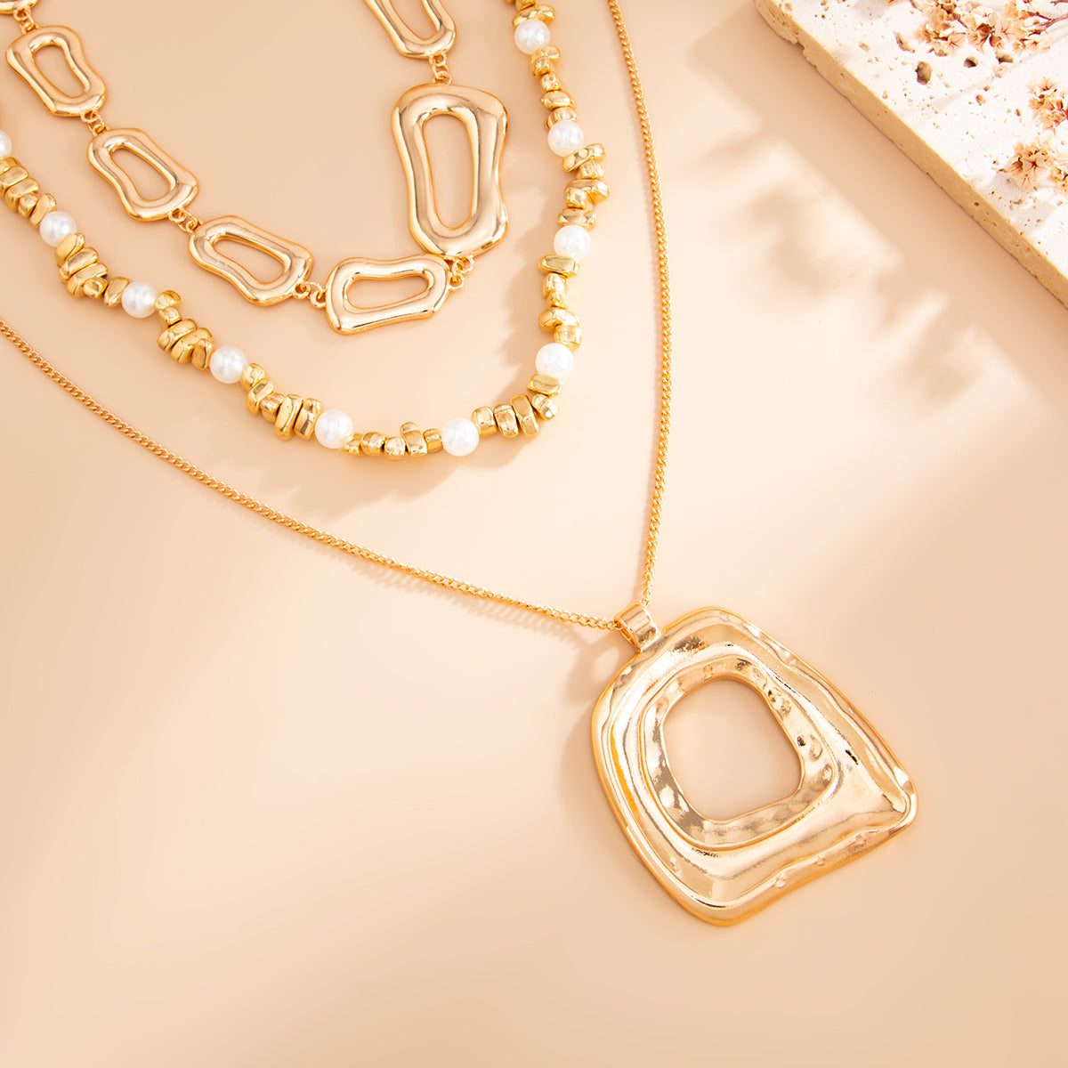 Pearl and Goldtone Irregular Geometric Pendant Necklace Set, gold pendant necklace for women, botanical inspired, side view