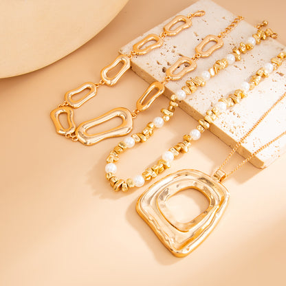 Pearl and Goldtone Irregular Geometric Pendant Necklace Set, gold pendant necklace for women, detail close-up