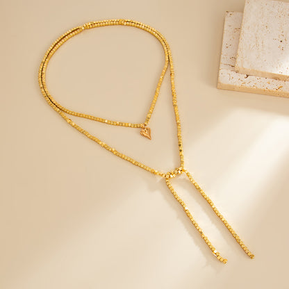 Goldtone Bead Chain Small Heart Pendant Toggle Necklace, everyday style, detail close-up