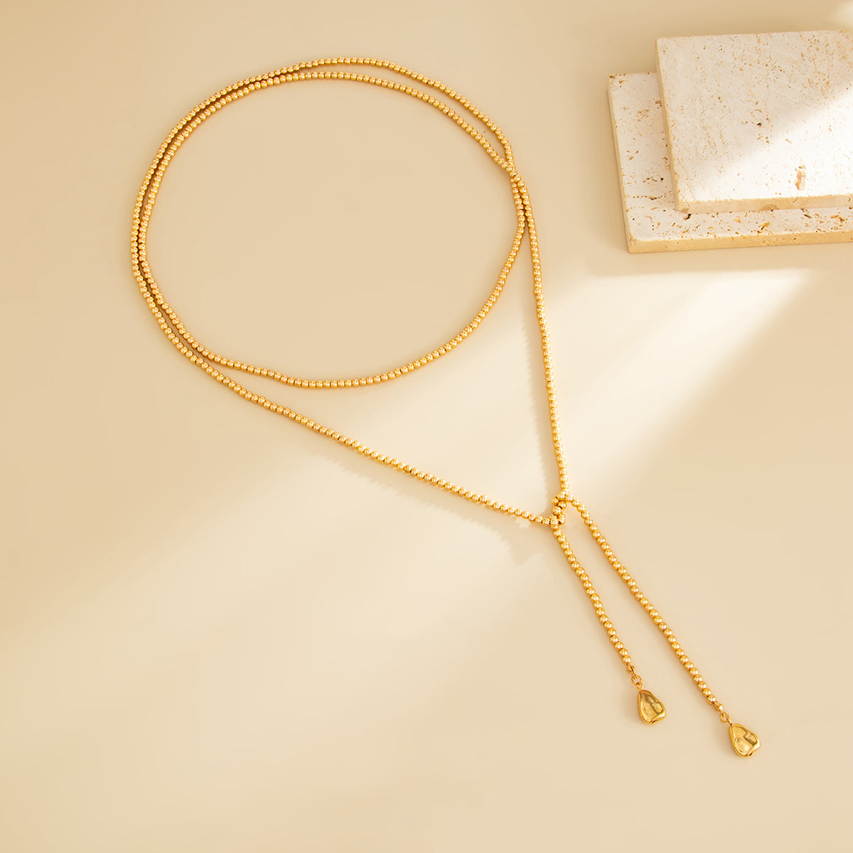 Goldtone Drop Bead Chain Necklace, everyday style, side view