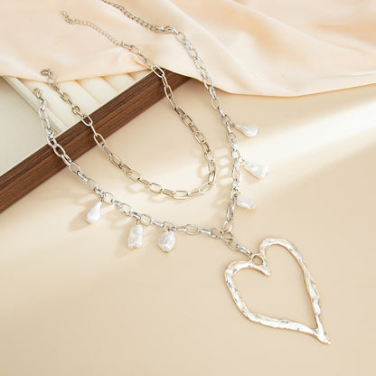 Pearl & Silvertone Open Heart Pendant Statement Necklace