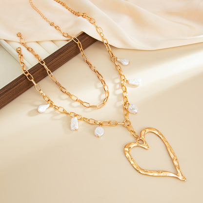 Pearl & Goldtone Open Heart Pendant Statement Necklace