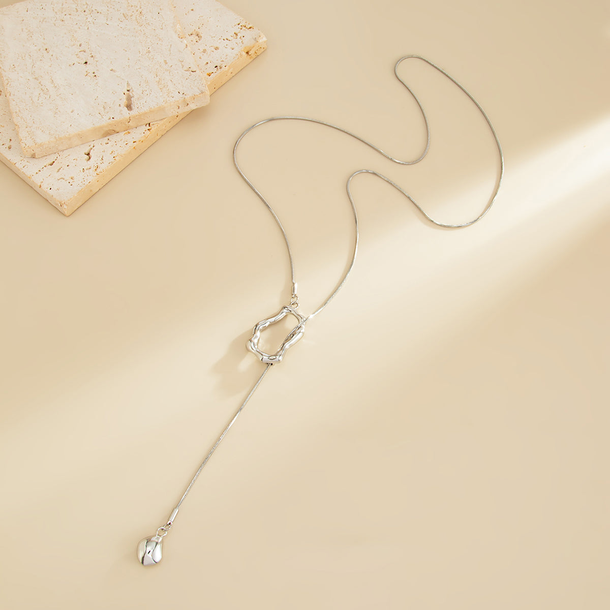 Silvertone Open Irregular Lariat Necklace, vintage-inspired design, side view