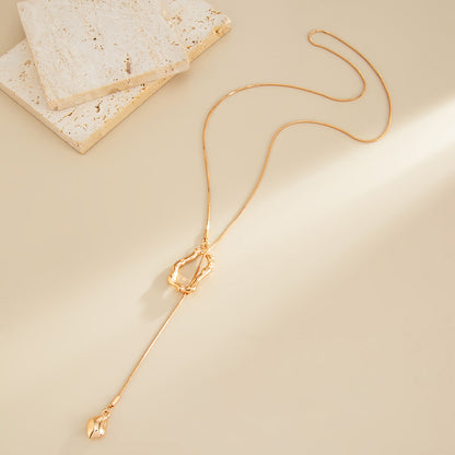 Goldtone Open Irregular Lariat Necklace, botanical inspired, side view