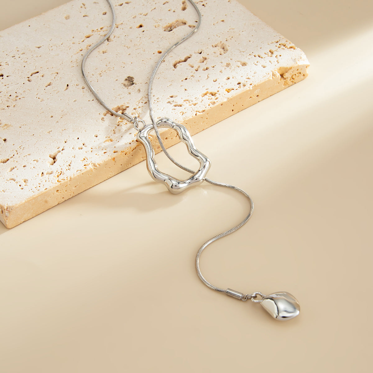 Silvertone Open Irregular Lariat Necklace, vintage-inspired design, detail close-up