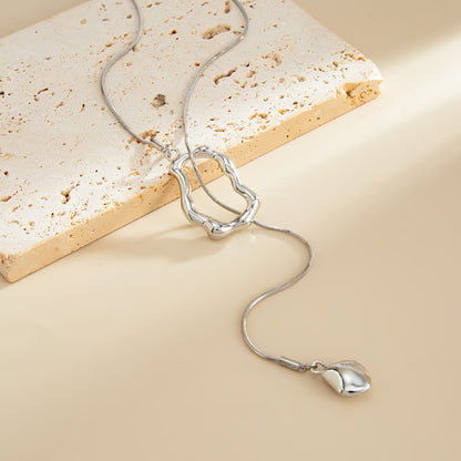 Silvertone Open Irregular Lariat Necklace, vintage-inspired design, detail close-up