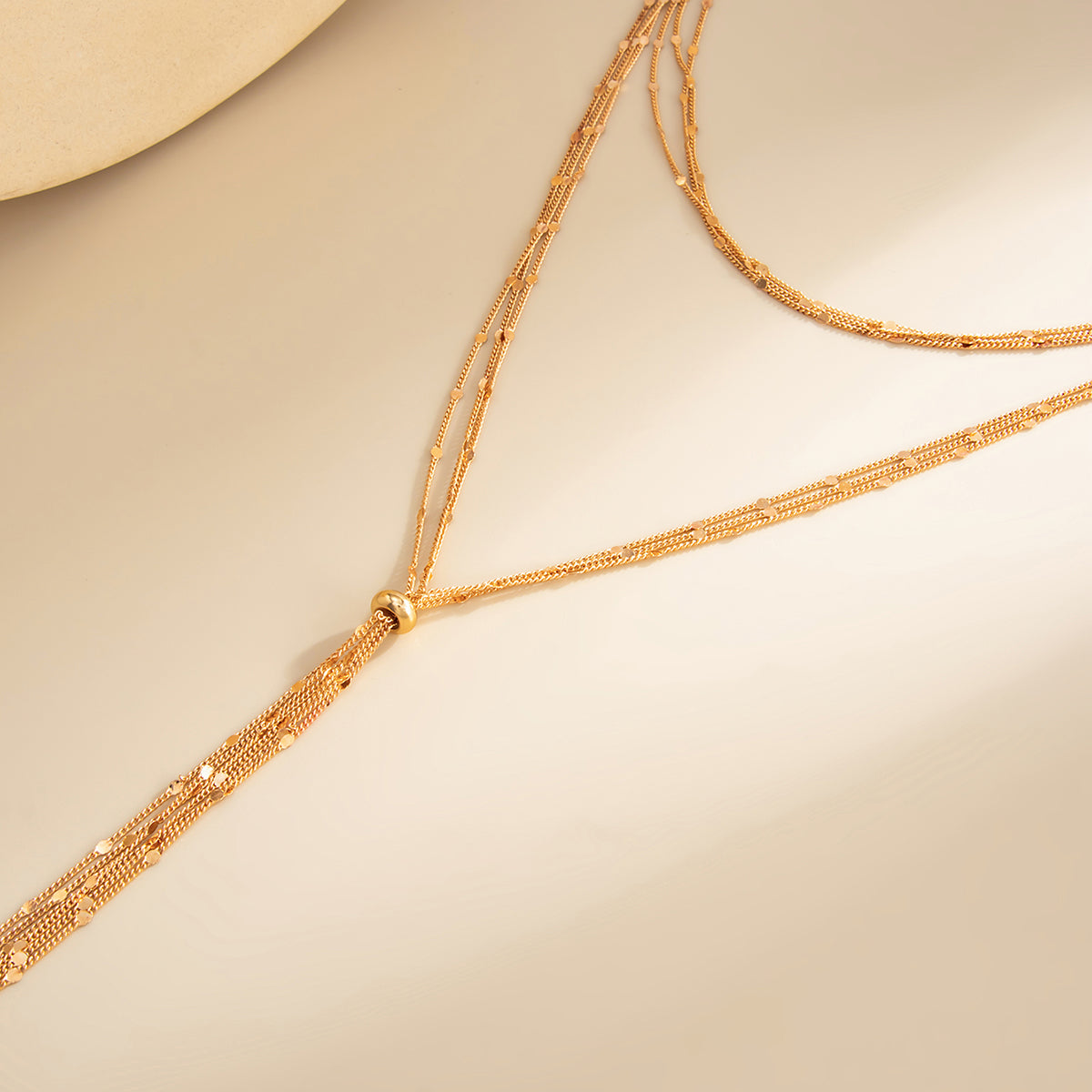Goldtone Multi-Strand Drop Tassel Necklace, elegant gift for her, detail close-up