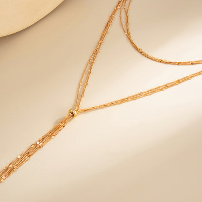 Goldtone Multi-Strand Drop Tassel Necklace, elegant gift for her, detail close-up