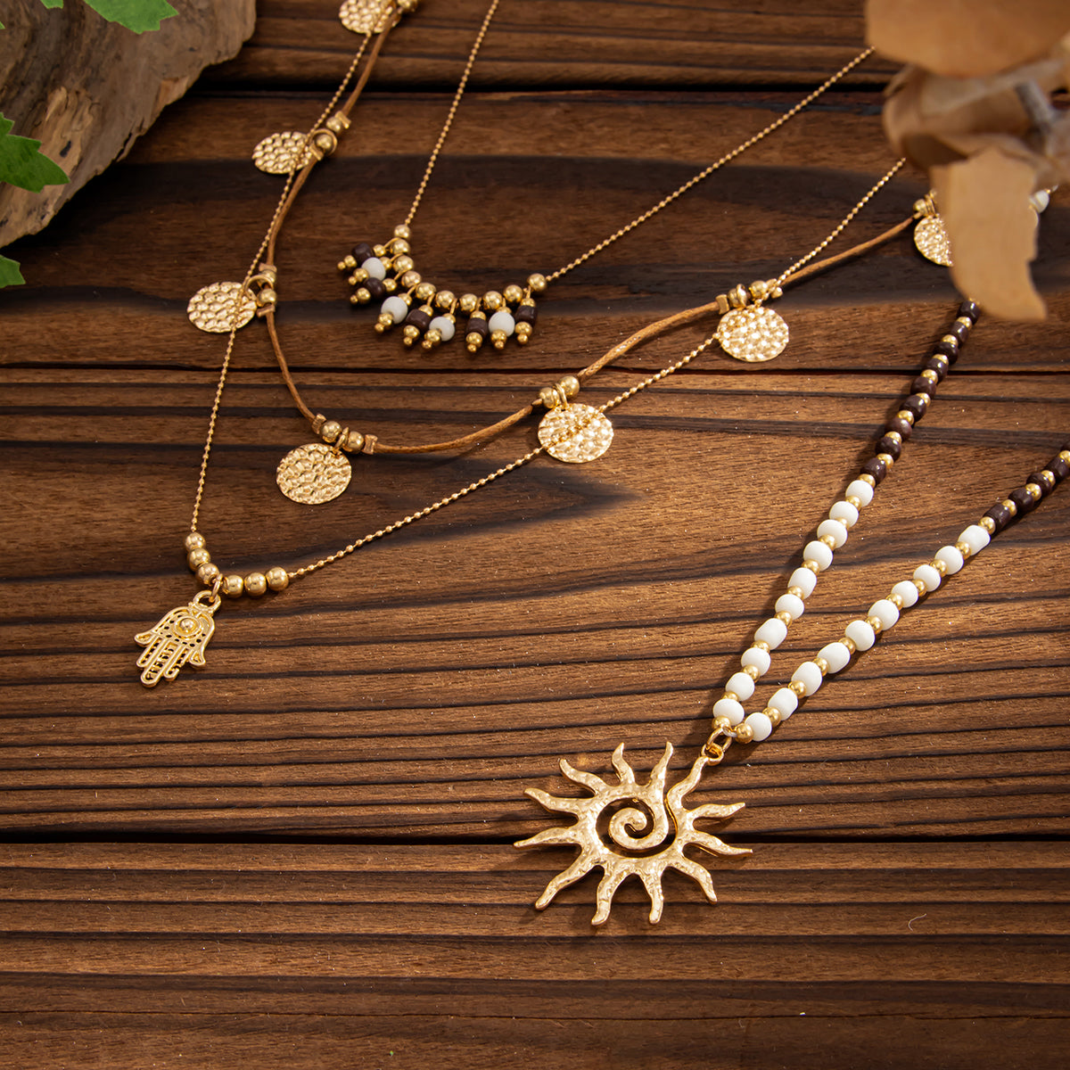 Black Howlite and Polyster Goldtone Hamsa Sun Pendant Necklace Set, gold pendant necklace for women, detail close-up