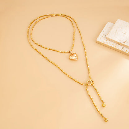 Goldtone Bead Chain Big Heart Pendant Toggle Necklace, vintage-inspired design, detail close-up