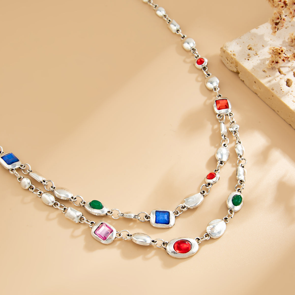 Multi-Colored Crystal and Silvertone Geometric Station Layered Necklace, vintage-inspired design, side view