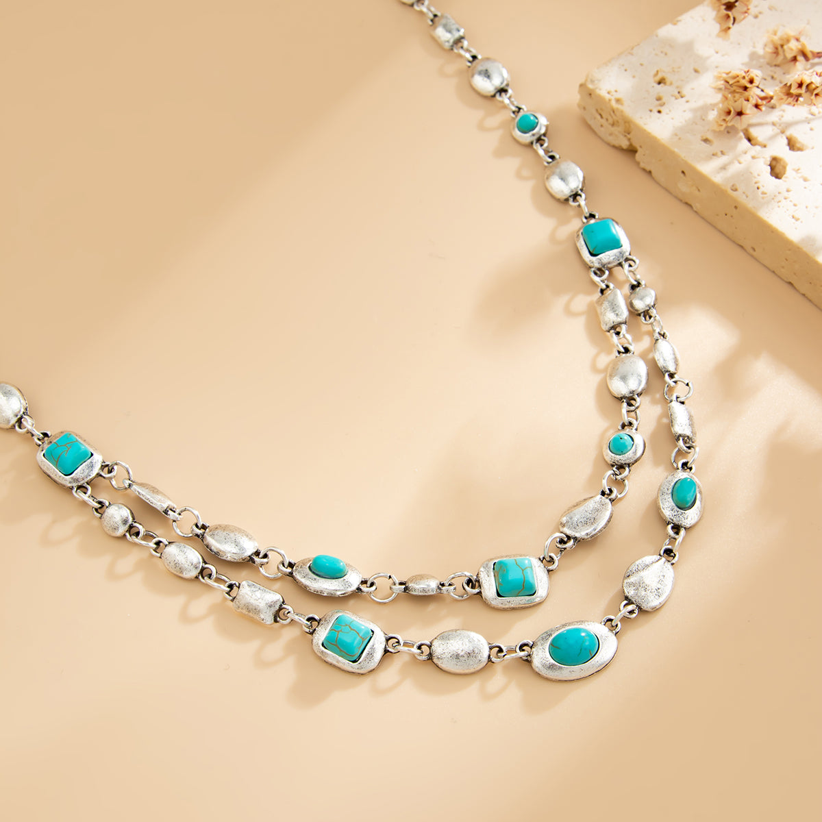 Turqouise and Silvertone Geometric Station Layered Necklace, vintage-inspired design, side view