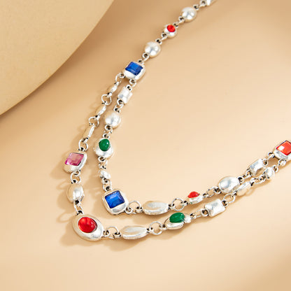 Multi-Colored Crystal and Silvertone Geometric Station Layered Necklace, vintage-inspired design, detail close-up