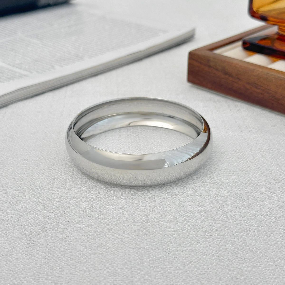 Silvertone Thin Bangle Bracelet, silver bangle bracelet, vintage-inspired design, side view