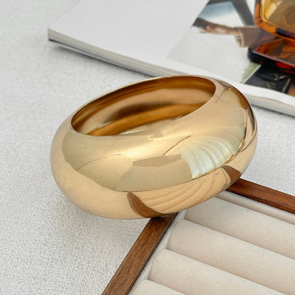 Goldtone Thick Bangle Bracelet, gold bangle bracelet, vintage-inspired design, side view