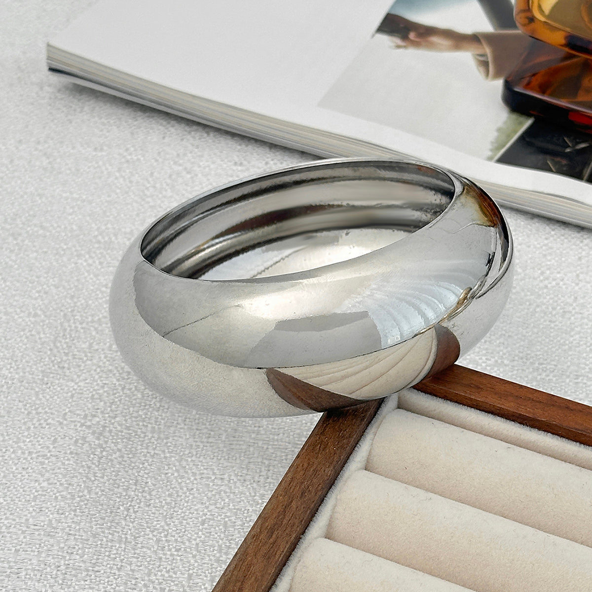 Silvertone Bangle Bracelet, silver bangle bracelet, botanical inspired, side view