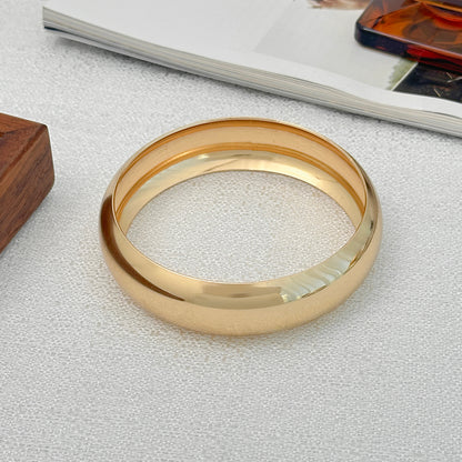Goldtone Thin Bangle Bracelet, gold bangle bracelet, dainty minimalist design, detail close-up
