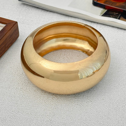 Goldtone Thick Bangle Bracelet, gold bangle bracelet, vintage-inspired design, detail close-up