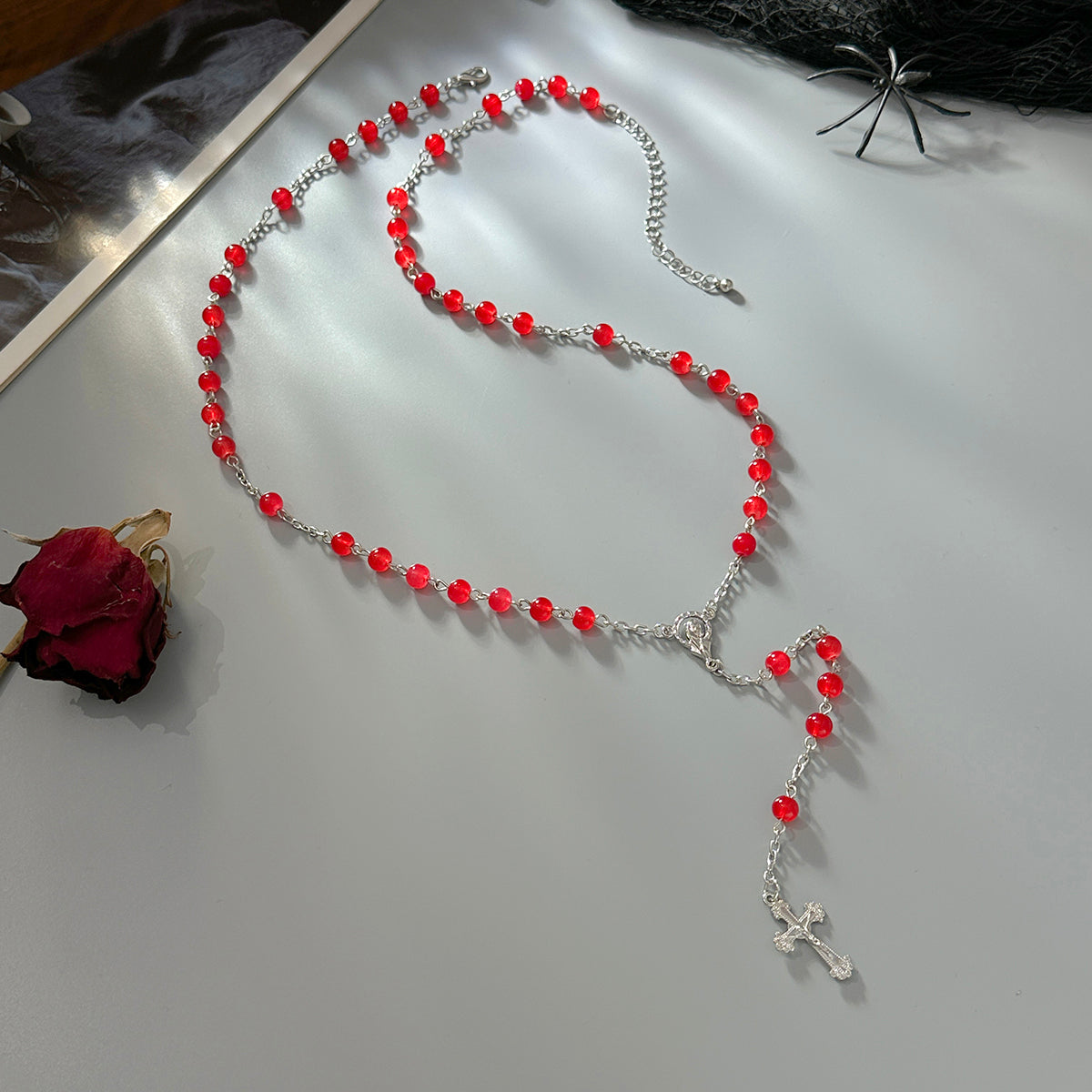 Red Acrylic and Silvertone Cross Drop Necklace, vintage-inspired design, side view