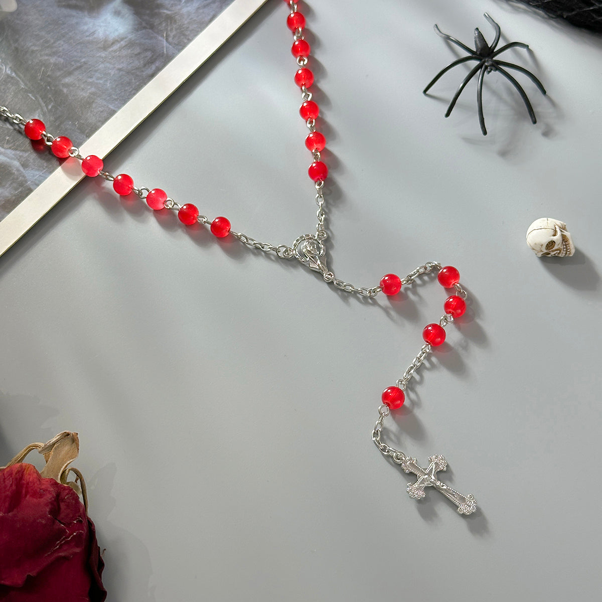 Red Acrylic and Silvertone Cross Drop Necklace, vintage-inspired design, detail close-up