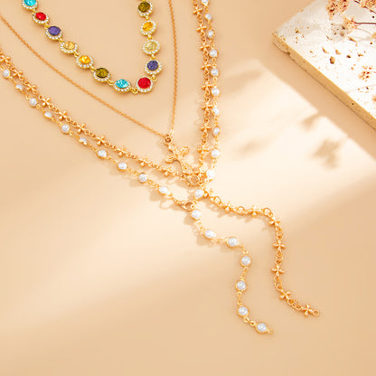 Multi-Colored Crystal and Cubic Zirconia  Pearl Goldtone Cross Lariat Necklace Set, gold pendant necklace for..., side view