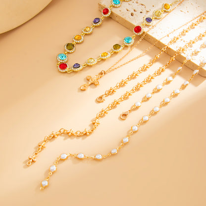 Multi-Colored Crystal and Cubic Zirconia  Pearl Goldtone Cross Lariat Necklace Set, gold pendant..., detail close-up
