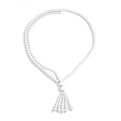 White Resin and Silvertone Graduated Bead Tassel Layered Necklace, vintage-inspired design, front view