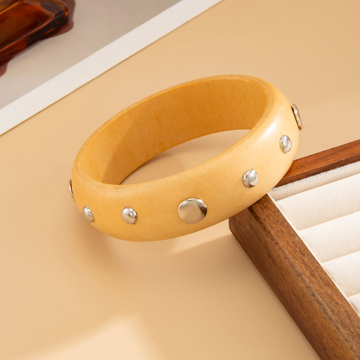 Yellow Wood and Silvertone Spot Station Bangle, silver bangle bracelet, everyday style, side view