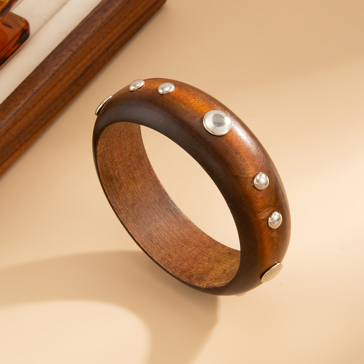 Brown Wood and Silvertone Spot Station Bangle, silver bangle bracelet, botanical inspired, detail close-up