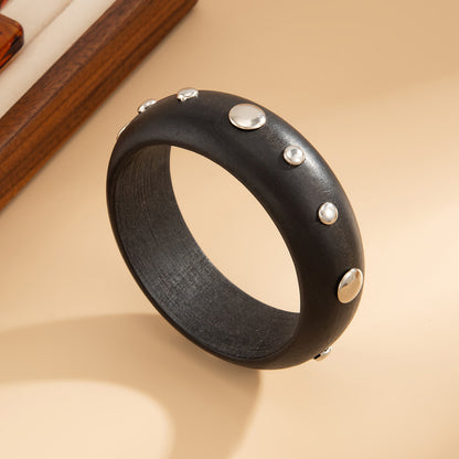 Black Wood and Silvertone Spot Station Bangle, silver bangle bracelet, botanical inspired, detail close-up