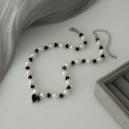 Black Acrylic and Crystal Pearl Silvertone Bead Chain Heart Pendant Necklace, dainty minimalist design, side view