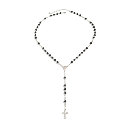 Black Acrylic and Silvertone Cross Drop Necklace, botanical inspired, front view