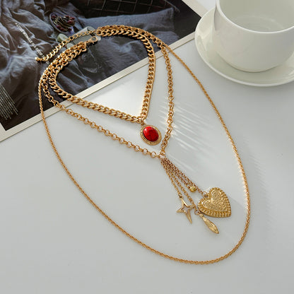 Red Resin and Goldtone Oval Star Heart Pendant Layered Necklace, botanical inspired, detail close-up