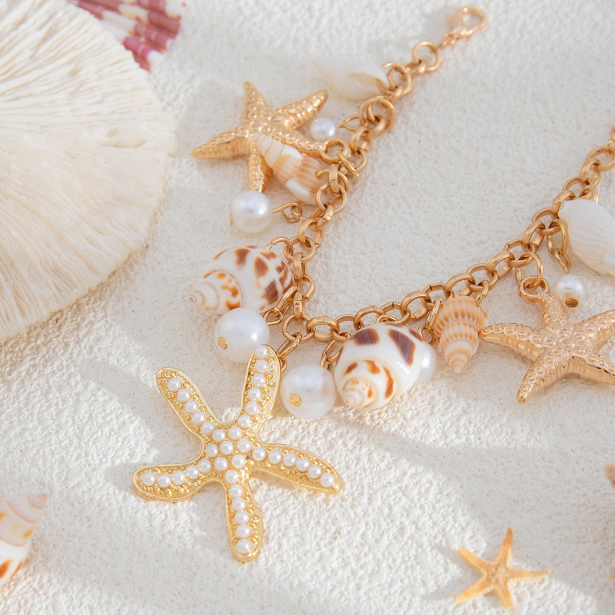 Conch Shell and Pearl Goldtone Starfish Charm Bracelet, elegant gift for her, detail close-up