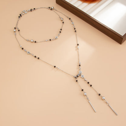 Colored Acrylic and Silvertone Bead Flower Station Long Necklace, vintage-inspired design, side view