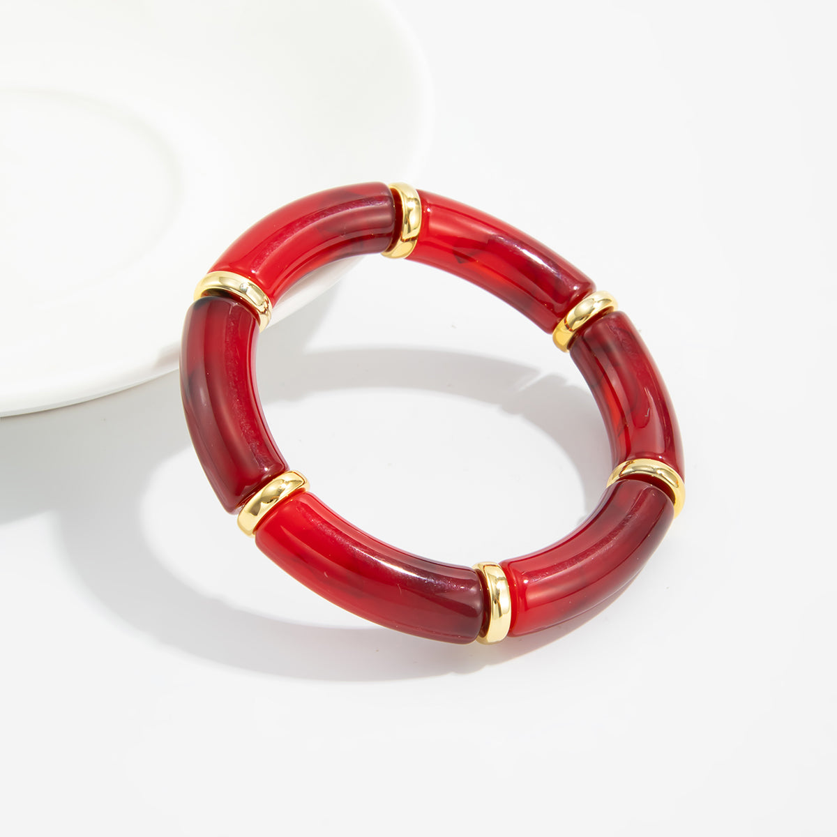Wine Red Resin and Goldtone Sequin Joint Stretch Bracelet, vintage-inspired design, lifestyle look