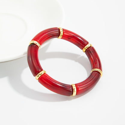 Wine Red Resin and Goldtone Sequin Joint Stretch Bracelet, vintage-inspired design, lifestyle look