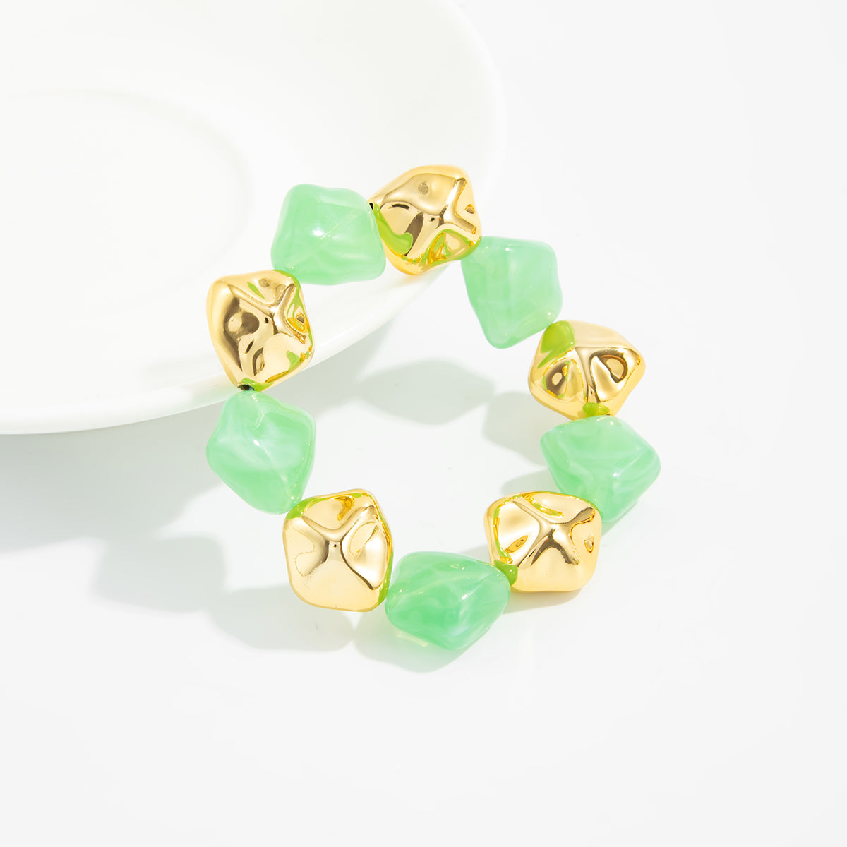 Green Resin and Goldtone Irregular Beads Station Stretch Bracelet, vintage-inspired design, lifestyle look