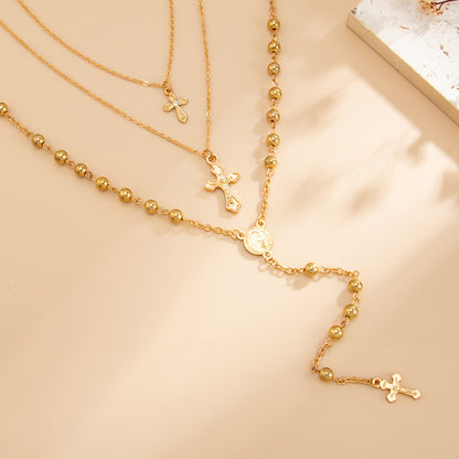 Goldtone Beads Chain Cross Pendant Drop Necklace Set, gold pendant necklace for women, vintage-inspired design, side view