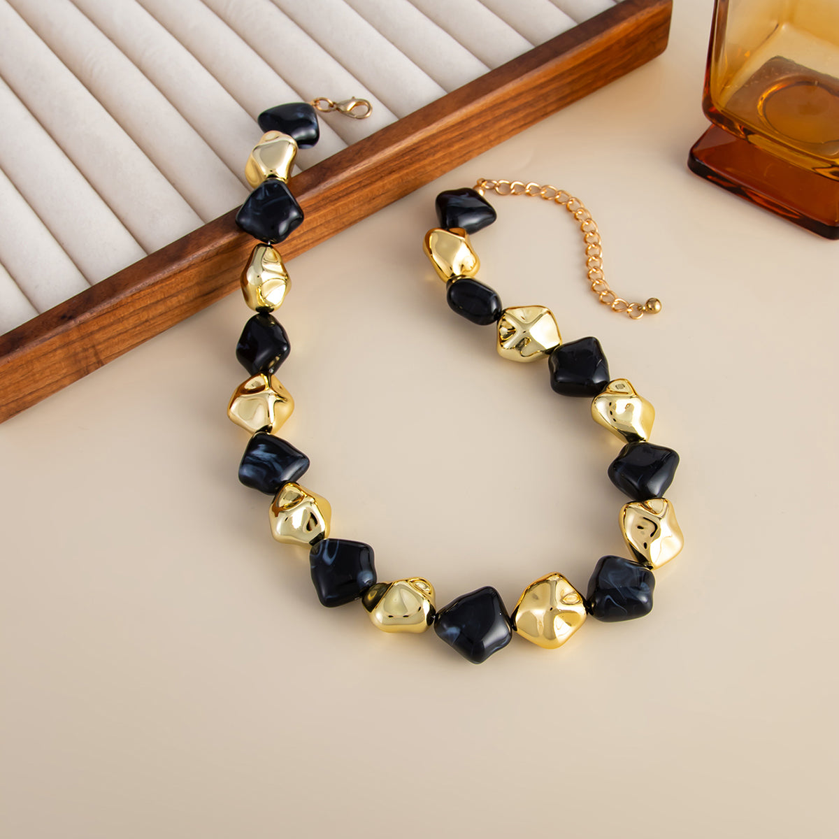 Black Resin and Goldtone Irregular Rhombus Station Collar Necklace, dainty minimalist design, side view