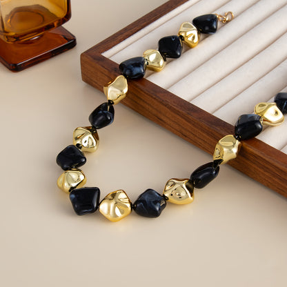 Black Resin and Goldtone Irregular Rhombus Station Collar Necklace, dainty minimalist design, detail close-up