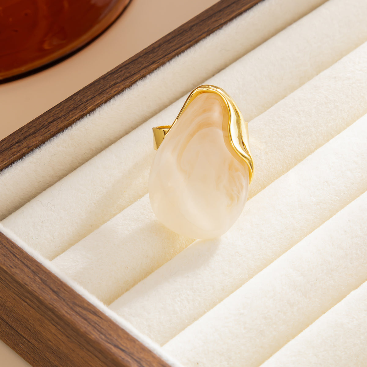 White Resin and Goldtone Irregular Drop Open Ring, vintage-inspired design, side view