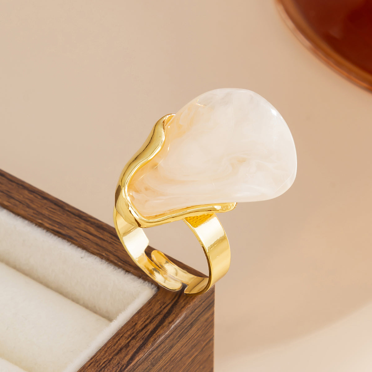 White Resin and Goldtone Irregular Drop Open Ring, vintage-inspired design, detail close-up